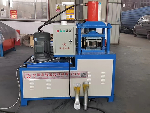 Round tube flattening and punching machine